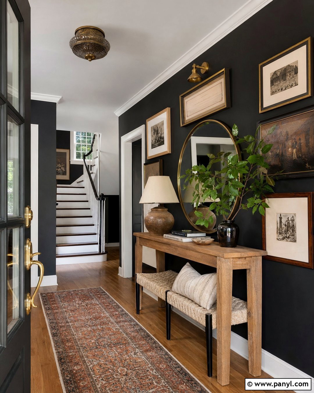 Black Entryway Gallery Wall - 35 black painted room ideas