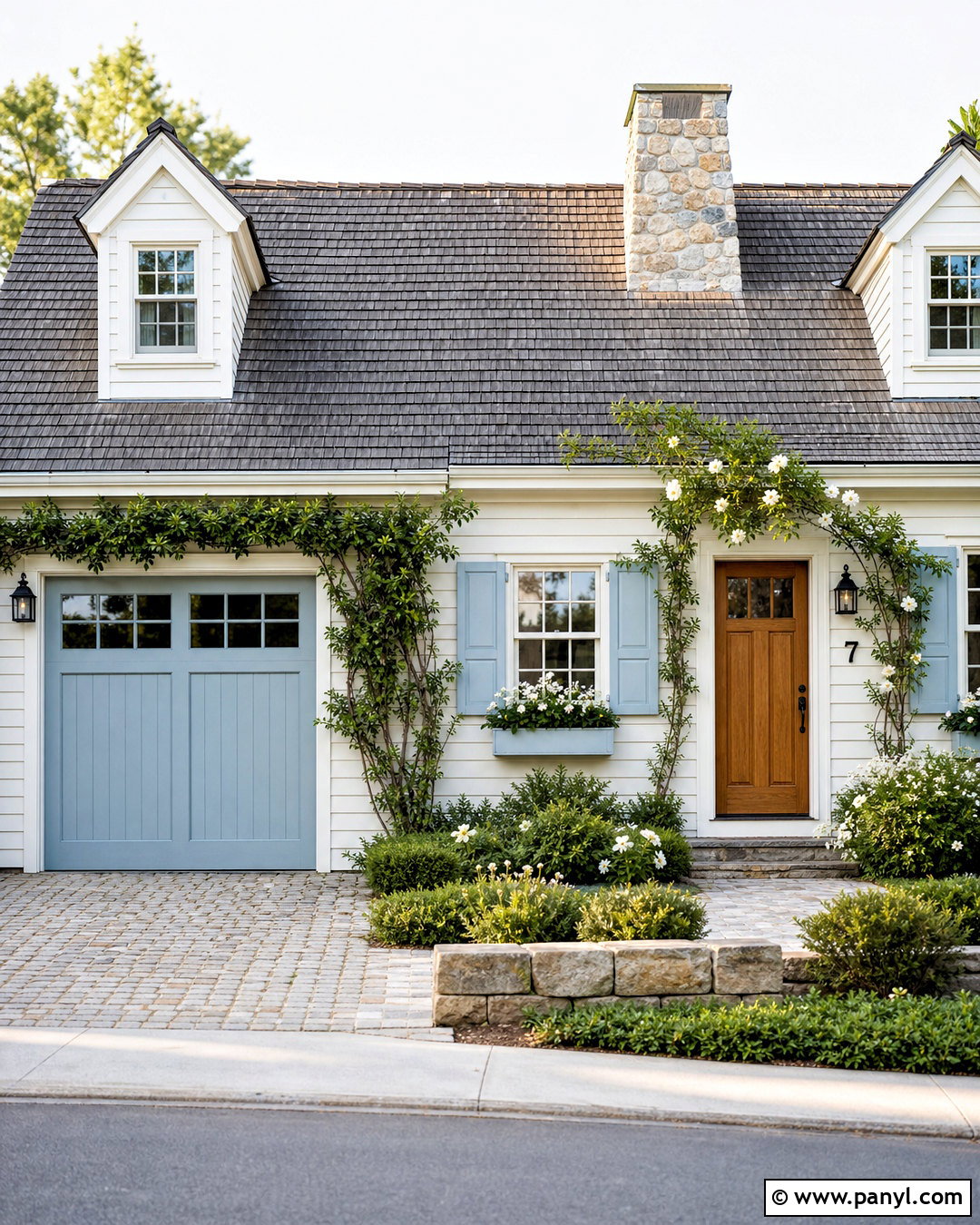 Pale Blue Garage Door With Cottage Siding - 20 garage door painting ideas