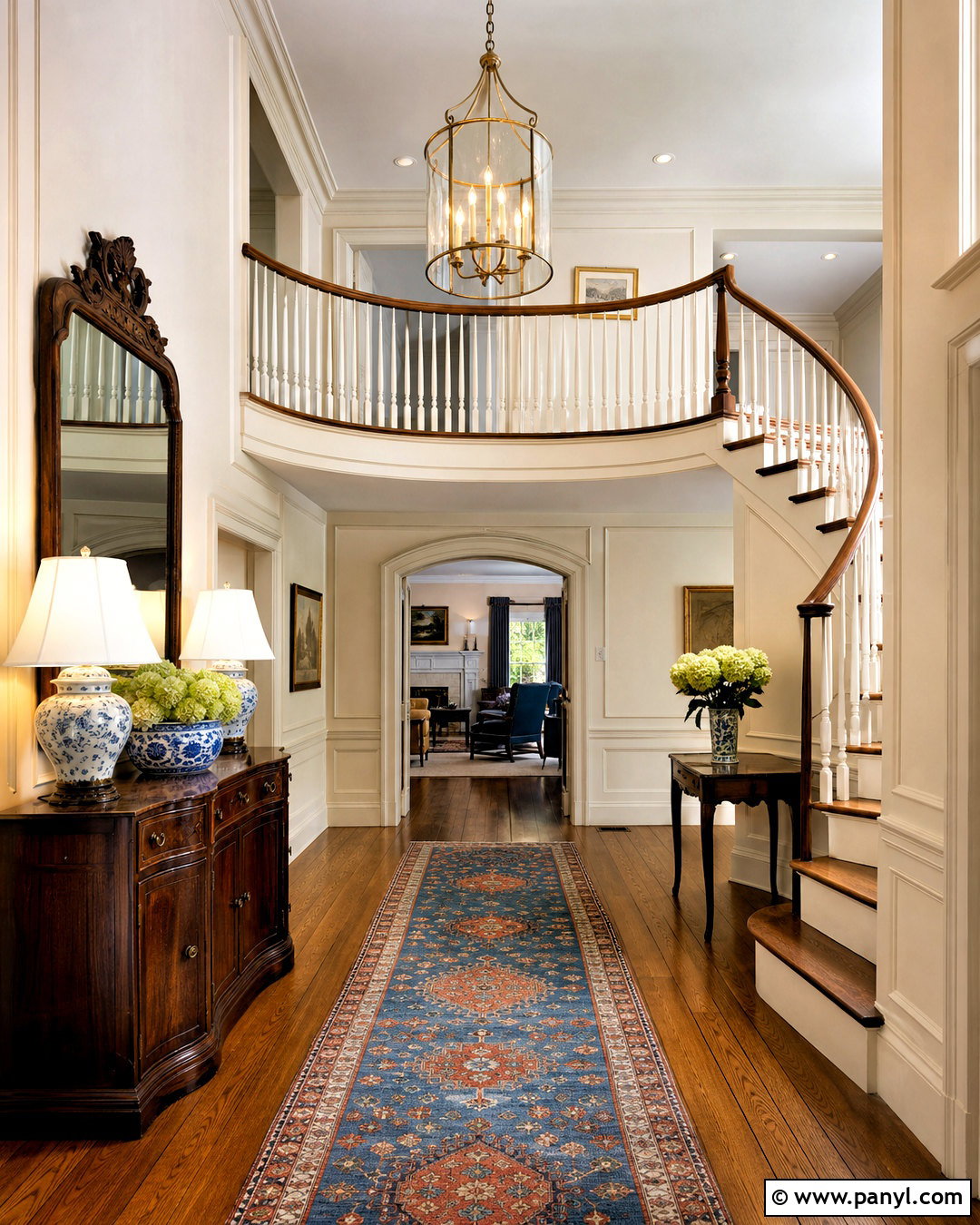 Traditional Entryway With Tiered Brass Chandelier - 20 tall entryway ideas high ceilings