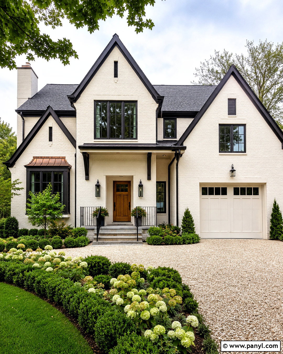 Warm White Painted Brick With Black Trim - 20 painted brick house before and after ideas