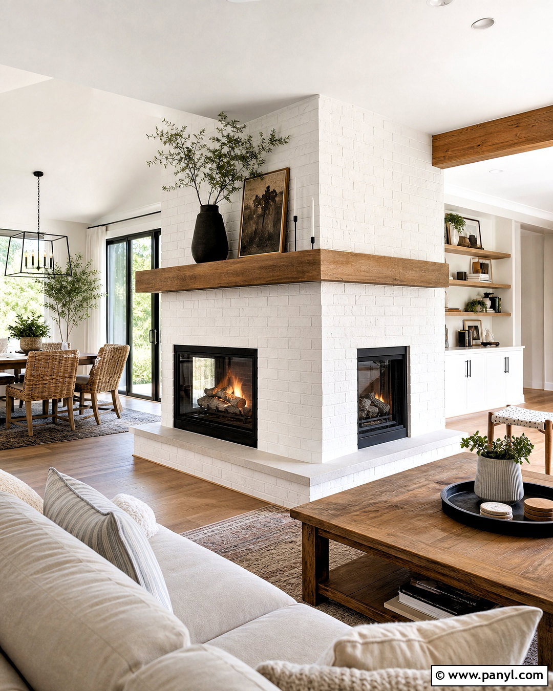 White Brick Double-Sided Fireplace - 20 white painted brick fireplace ideas